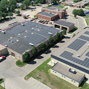 Solar panels on city building rooftops